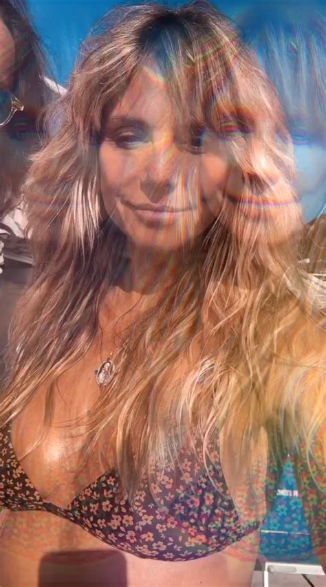 AGT S Heidi Klum Nearly Spills Out Of Teeny Floral Bikini Top In Steamy Video With Husband Tom