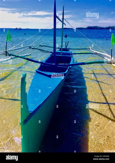 Bangka Boat on beach, Philippines Stock Photo - Alamy