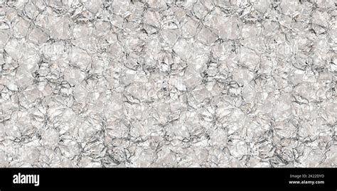 Seamless Ripped And Crumpled Silver Aluminim Foil Background Texture