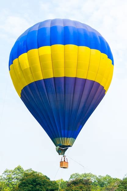 Premium Photo Colorful Hot Air Balloons In Flight Over Blue Sky Soft