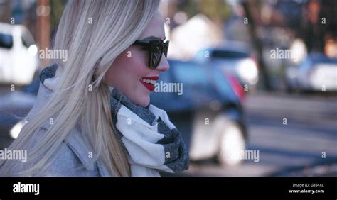 Beautiful Blonde Woman Smiling To The Camera Stock Photo Alamy