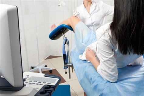 Cropped Panorama of Gynecologist Examining a Patient Who is Sitting in ...