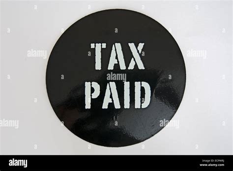 Tax Paid Disc Stock Photo Alamy