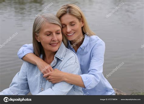 Happy Mature Mother Her Daughter Hugging Pond Stock Photo Newafrica