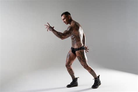 Handsome Bodybuilder Posing Athlete Shows Bodybuilding Posing Hot Tattooed Man Stock Image