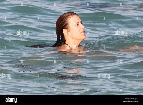 Kate Walsh Shows Off Her Figure Wearing A Black Bikini As She Spends The Day On The Beach In
