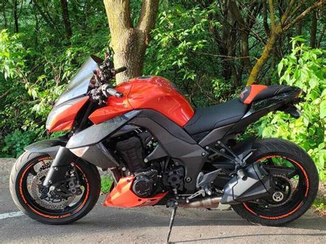Купить б у Kawasaki Z 1000 инжектор 6 передач в Москве оранжевый naked bike 2011 года на Авто