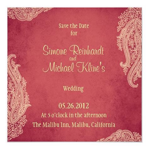 an elegant red and gold wedding save the date card with paisley design on it,