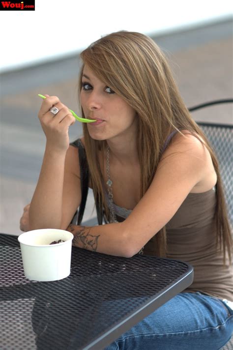 Cute Babe Poses For Clothed Photos With Some Froyo Photos