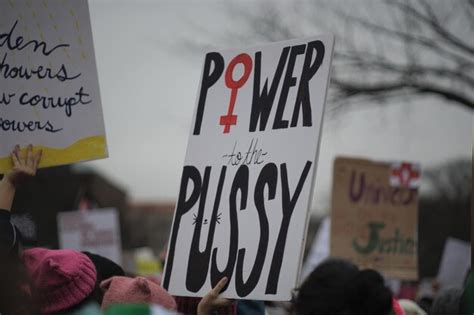 Premium Photo Power Pussy Feminist Sign On Crowd During Woman March Protest In Washington Dc