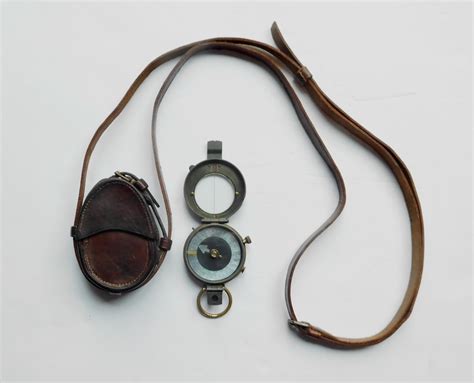 A Ww1 British Military Officers Prismatic Marching Compass Dated 1915 With An Original Leather