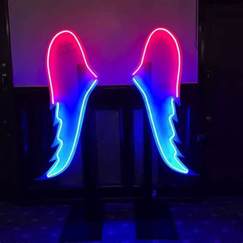 Neon Angel Wings Mural on Broadway