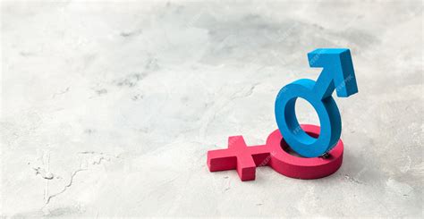Simbolos Mulher E Homem - Símbolos de gênero de homem e mulher em um fundo cinza. | Foto Premium