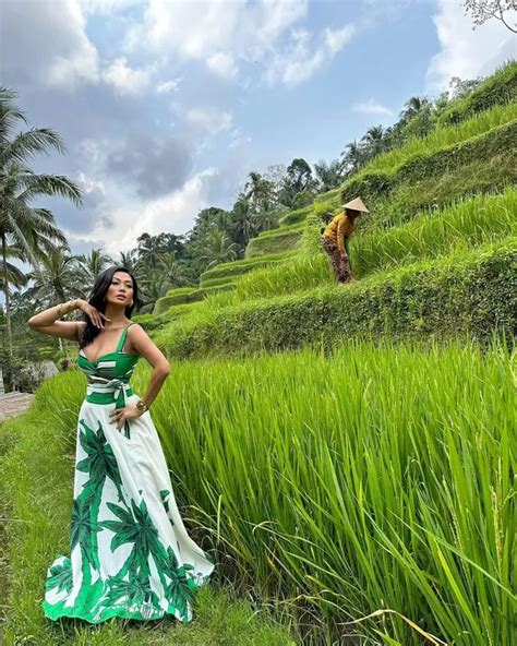 8 Beautiful Photoshoots Of Indah Kalalo In The Rice Fields Hot With High Slit Dresses And