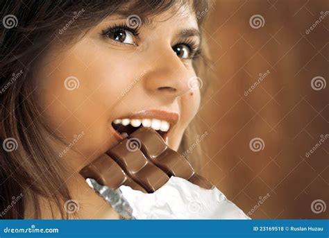 Cute Brunette Eats Chocolate Stock Photo Image Of Pretty Girl