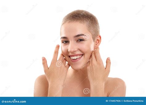 Glowing Skin Portrait Of A Beautiful Smiling Blond Woman With Short Hair And Nude Make Up