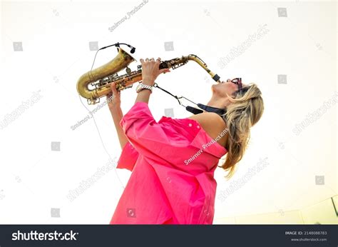 Saxophone Blonde Girl Sun Set Background Stock Photo 2148088783 Shutterstock