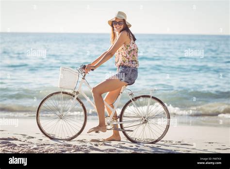 Pretty Brunette Woman On A Bike Ride Stock Photo Alamy
