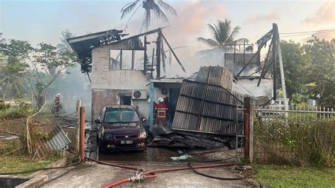 Two families escape unscathed after fire destroys house