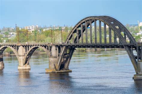 Premium Photo View Of River Dnepr And Railway Ancient Arched Bridge