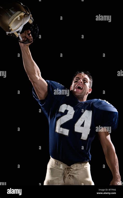 Football player celebrating Stock Photo - Alamy