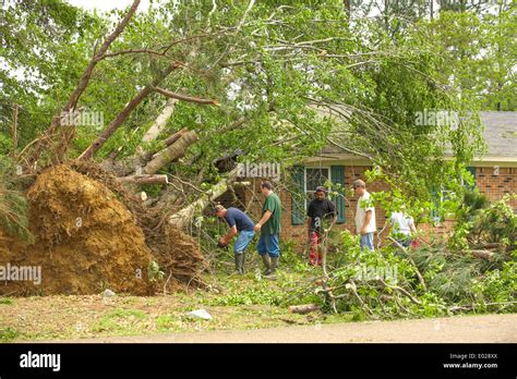 Helping neighbors after tornado hi-res stock photography and images - Alamy