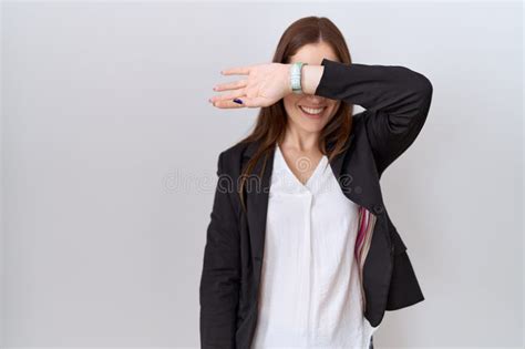Beautiful Brunette Woman Wearing Business Jacket And Glasses Yawning Tired Covering Half Face