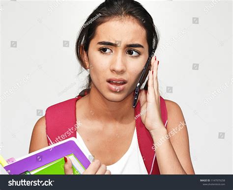 Latina Girl Student Using Cell Phone Stock Photo Edit Now 1147979258