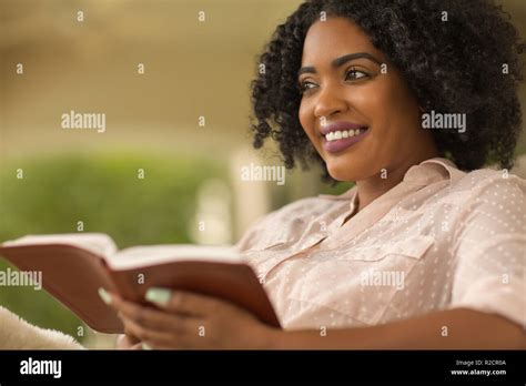 African American Woman Reading Bible Hi Res Stock Photography And