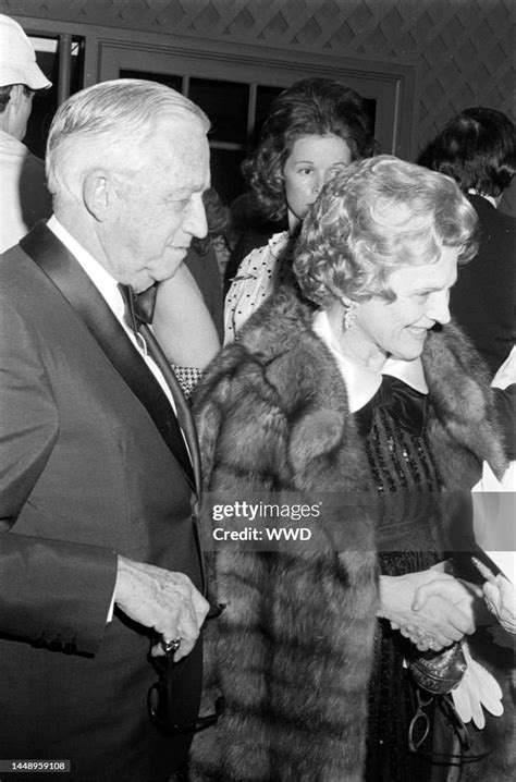 Mervyn LeRoy and Kitty LeRoy attend the opening of Bonwit Teller's