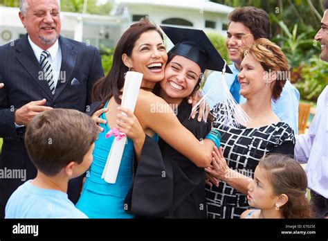 Hispanic Student And Family Celebrating Graduation Stock Photo - Alamy