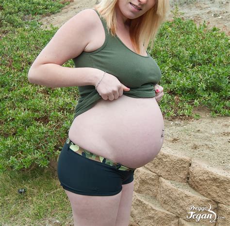 Pregnant Girl Holds A Sex Toy While Showing Her Hairless Vagina CoedCherry