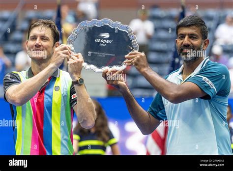 Matthew Ebden Of Australia And Rohan Bopanna Of India Hold Their Runner