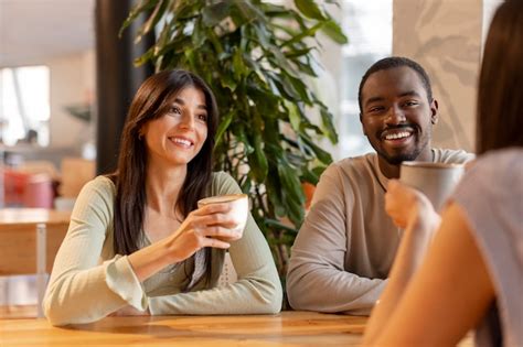 Free Photo People Drinking Coffee In Spacious Cafeteria