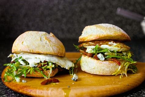 delicious fried egg sandwich  bacon  blue cheese