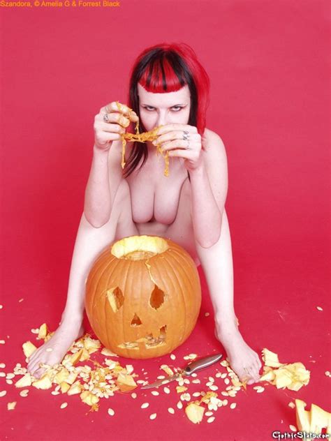 Naked Babe Szandora Poses With A Carved Pumpkin Photos