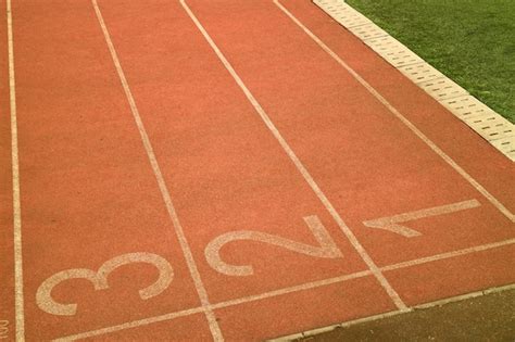 Premium Photo Running Track Around The Football Field