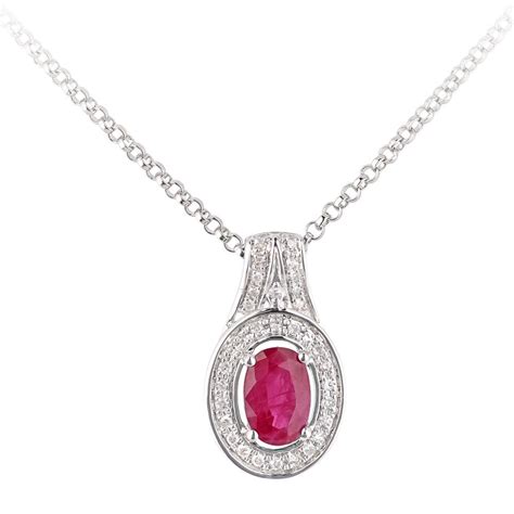 SPARKLD 18ct White Gold Oval Ruby And 0 08ct Diamond Cluster Pendant