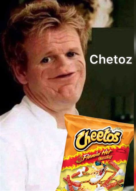 A Man Holding A Bag Of Cheetos In Front Of His Face