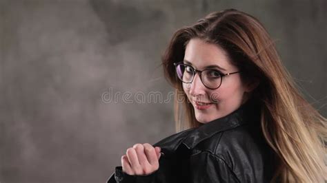 Portrait Of A Blonde Girl Posing For The Camera In A Studio Extreme Slow Motion Stock Video