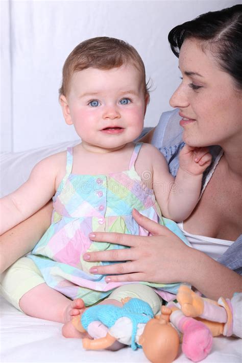 Woman Holding A Baby Stock Photo Image Of Blue Women 26793704