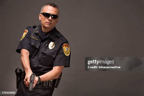 5,364 Police Officer Holding Gun Stock Photos, High-Res Pictures, and Images - Getty Images