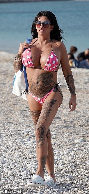 Katie Price Shows Off Her Biggest Boob Job Ever In TINY Pink Bikini Daily Mail Online
