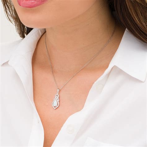 Pear Shaped Lab Created Opal And White Sapphire Interwoven Drop Pendant In Sterling Silver