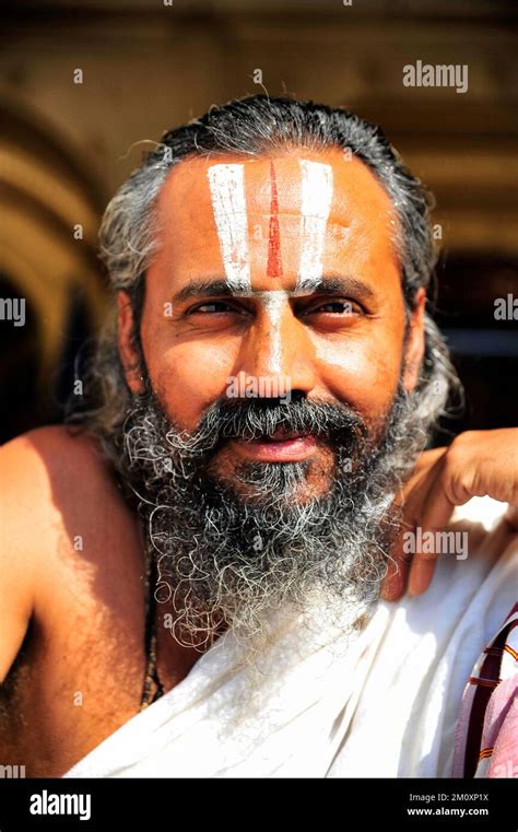 Portrait Of A Sadhu Holy Man On The Ghats Of River Ganges Varanasi