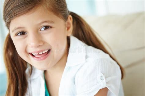 Bright Future Awaits This One Closeup Portrait Of A Cute Young Girl Smiling At You Happily