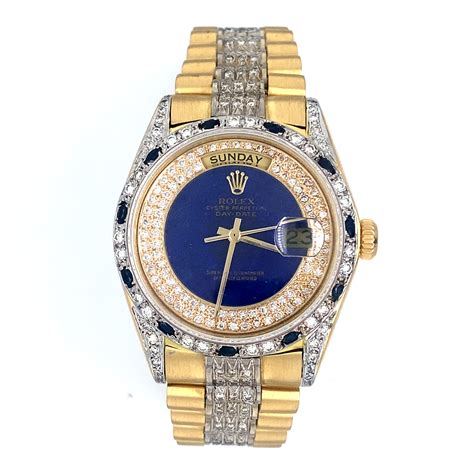 gold rolex  diamonds blue face mayas gold