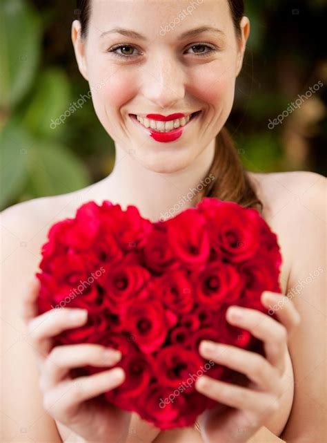 Nude Girl Holding A Red Roses Heart In A Garden Stock Photo By Mjth
