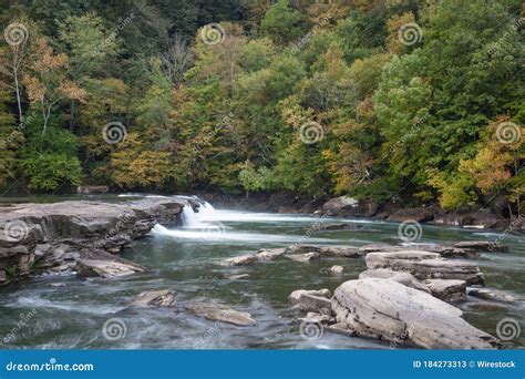 Valley Falls On The Tygart Valley River Surrounded By Greenery At