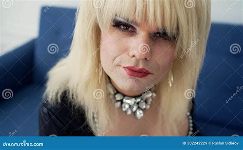 Man with Make-up in the Mirror, Travesty Diva. a Drag Queen Poses in ...